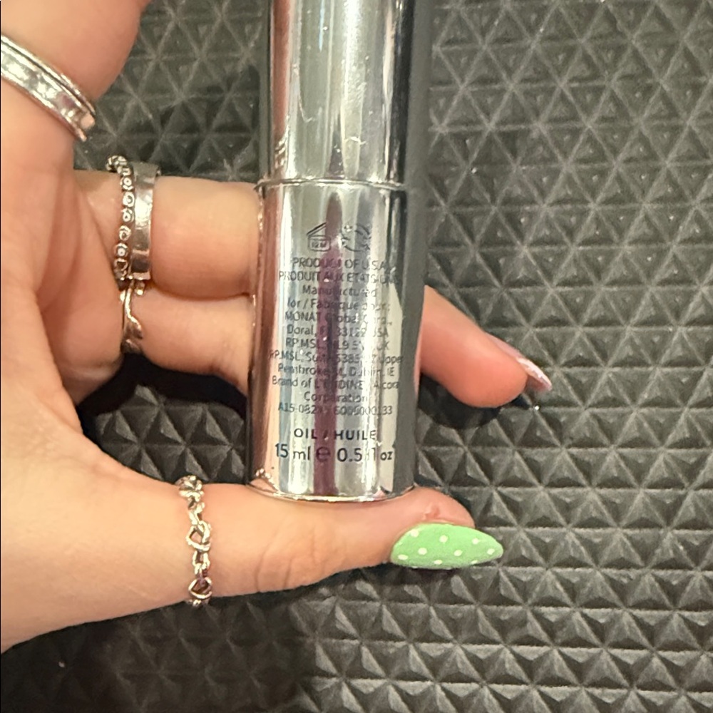 Rejuveniqe by Monat Silver Bottle - Picture 2 of 3